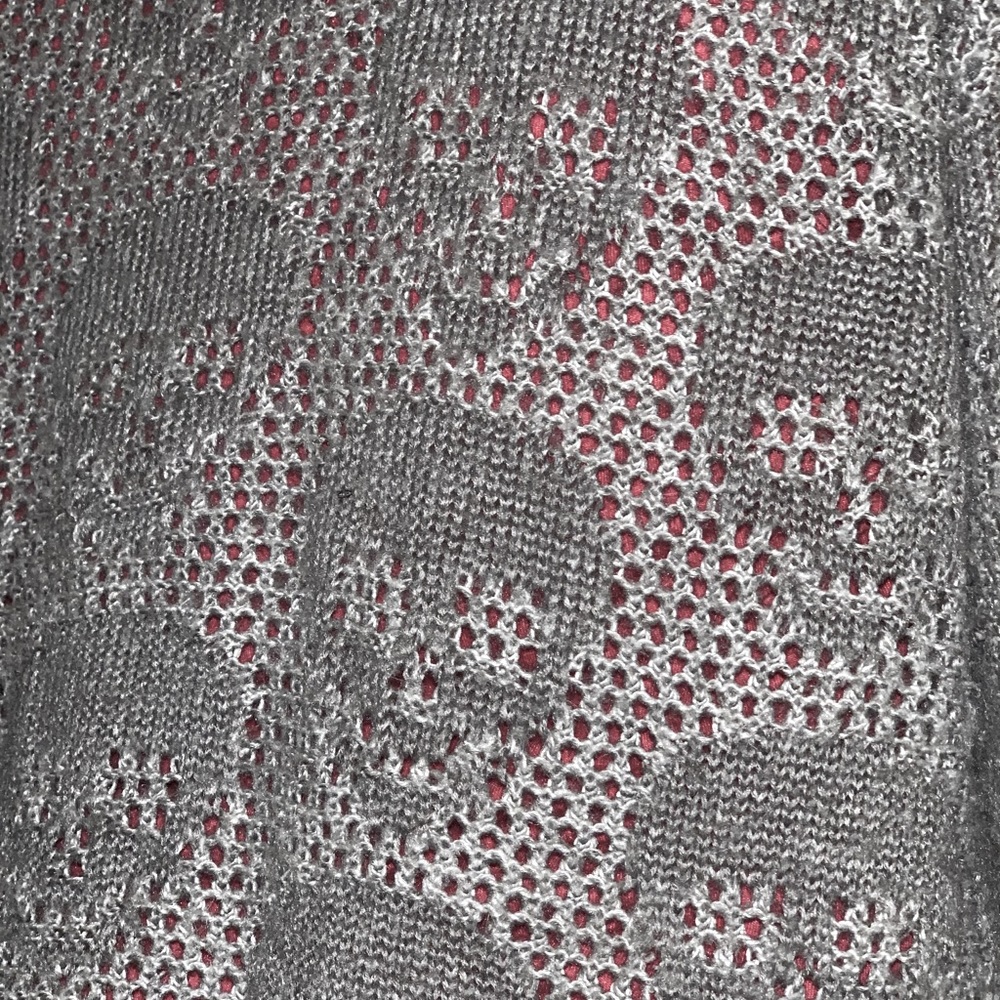 A skull designed gray sweater